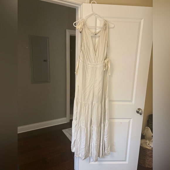 Free people movement flowy cream colored jumpsuit with ties - Picture 3 of 3